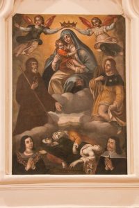 Madonna del Carmine tra San Francesco di Paola e San Rocco e committenti del 1658