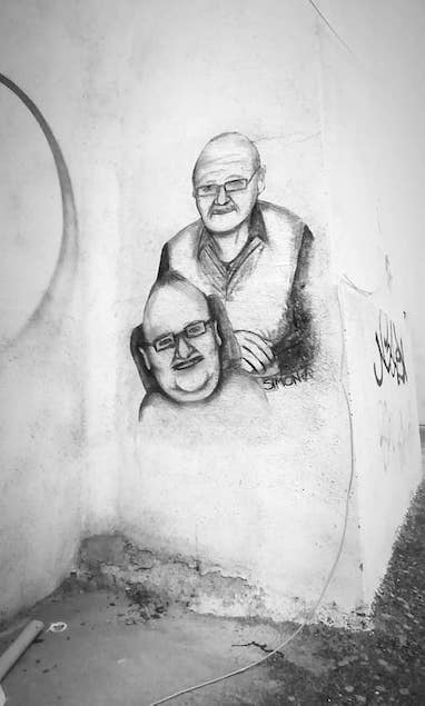 Lamezia: Street Art, il ritratto di Antonio e Pino Saffioti sul muro adiacente la Biblioteca Comunale