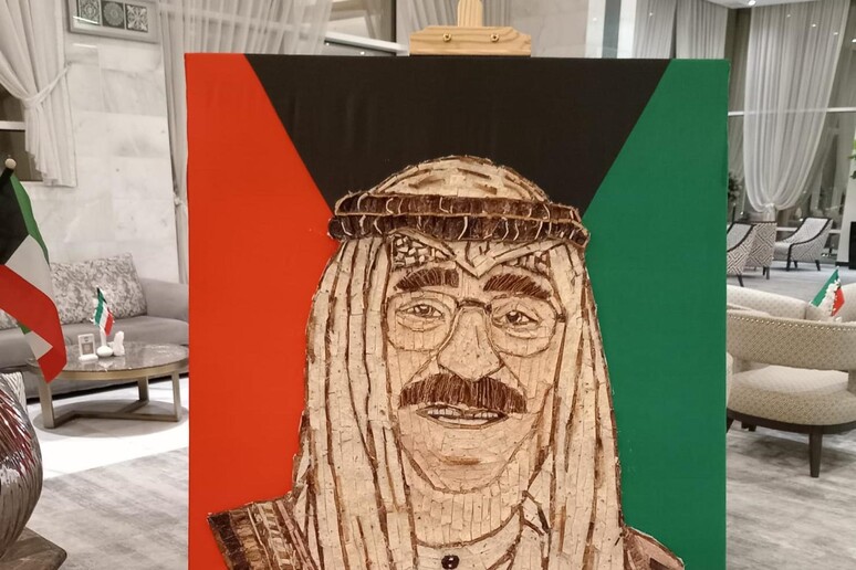 Mosaico con la pizza per la festa della liberazione del Kuwait